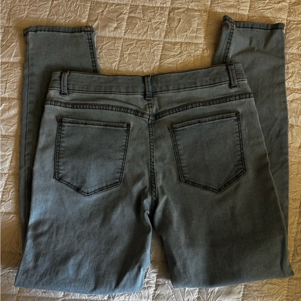 Distressed Light Blue Jeans